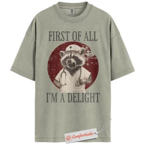 Funny Nurse Raccoon Shirt, First of All I'm a Delight T-Shirt, Animal Medical Worker Tee, Healthcare Graphic Comfort Colors Shirt