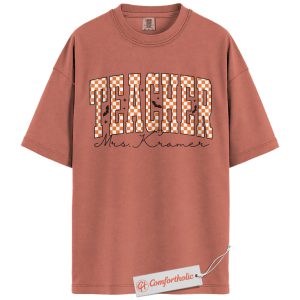 Personalized Teacher Halloween Shirt, Custom Name T-Shirt for Educators, Cute Checkered Pumpkin Fall Graphic Tee, Spooky Classroom Gift, Teacher Comfort Colors Shirt