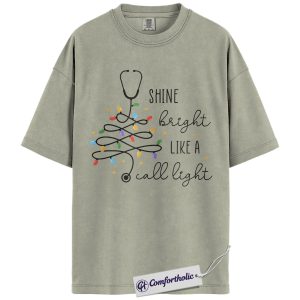 Alternative view of Shine Bright Like a Call Light Shirt, Funny Nurse Christmas T-Shirt, Cute Medical Worker Graphic Tee, Christmas Gift for Nurses and Healthcare Professionals, Christmas Comfort Colors Shirt