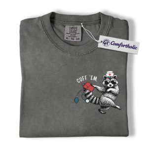 Alternative view of Cuff ’Em Raccoon Nurse Shirt, Funny Medical Worker T-Shirt, Cute Healthcare Animal Graphic Tee, Nurse Appreciation Gift, Comfort Colors Shirt