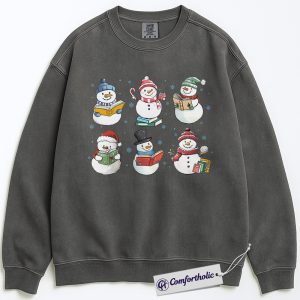 Alternative view of Christmas Book Lover Sweatshirt, Cute Snowman Reading Sweatshirt, Winter Literary Graphic Sweatshirt, Holiday Gift for Teachers and Readers, Christmas Comfort Colors Sweatshirt