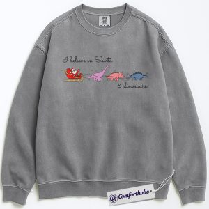 I Believe in Santa and Dinosaurs Sweatshirt, Funny Dinosaur Christmas Pullover, Cute Santa Dino Graphic Crewneck, Whimsical Holiday Gift for Dinosaur Lovers, Christmas Comfort Colors Sweatshirt